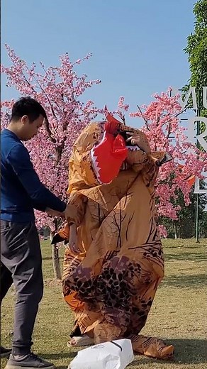 How to wear inflatable T rex costume