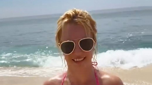 Britney Spears shows off her curves in tiny thong bikini for wild beach video