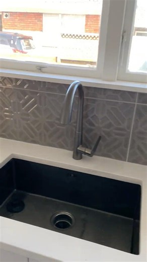 Tile splash back completed