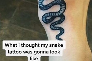 I asked for cute snake tattoo but it was so bad I had to wear long sleeves