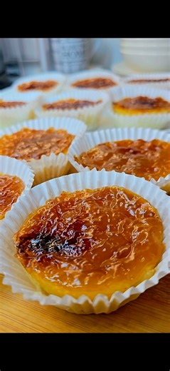 CASSAVA BIBINGKINITAN Introducing mini cassava bibingka – a delicious, bite-sized Filipino cassava cake! These moist little treats are naturally sweet and loaded with tropical flavor from coconut cream and condensed milk. Each mini bibingka is baked to golden perfection and topped with a dreamy coconut-caramel sauce. Perfect for dessert or an afternoon snack, and they're super easy to make. Ingredients Cassava cake batter: 2 cups (480 ml) grated cassava 1/4 cup (50 g) sugar 150 ml condensed milk