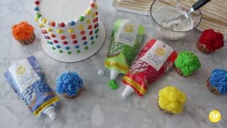 Decorated with colorful dots, this Polka Dot Birthday Cake is great for birthday celebrations young and old! Find more birthday cake inspiration here: http://ow.ly/Iass50hTWw4 | Wilton Cake Decorating