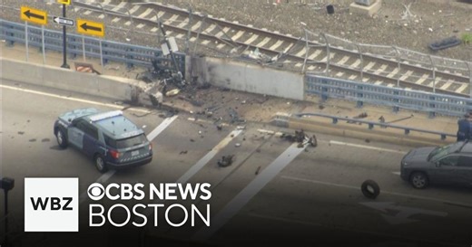 Driver killed in fiery crash after going through fence and plunging 40 feet below
