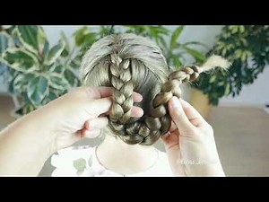 Simple way to make a bun from a braid. Easy hairstyle.