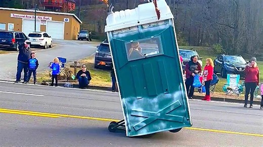 Souped-up porta potty pops a wheelie