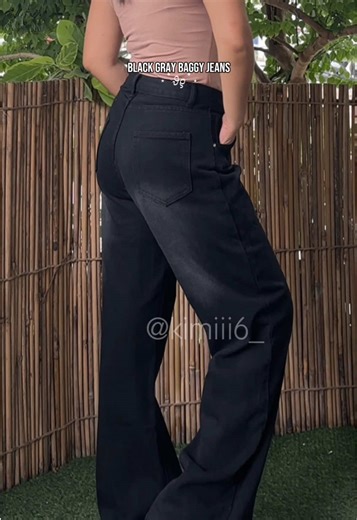 Black gray baggy jeans .