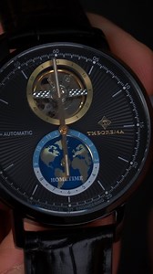 6.4K views · 52 reactions | Automatic Ibiza by Theorema, Germany. A standout feature is the open-heart design at 12 o'clock, revealing the watch's inner workings, while the world map at 6 o'clock enhances the dual-time function. Sapphire crystal on both sides ensures a clear view of its intricate details, including the Geneva stripes on the polished rotor. | Tufina Watches | Facebook