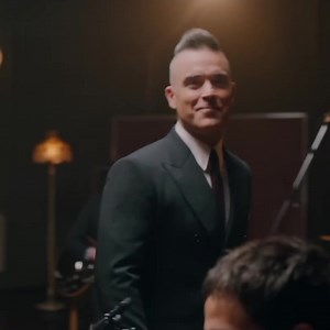 2.3K views · 104 reactions | Robbie Williams' version of "Merry Xmas Everybody" featuring Jamie Cullum, from his 2019 album "A Christmas Present" which is 4 years old today! | Slade | Facebook