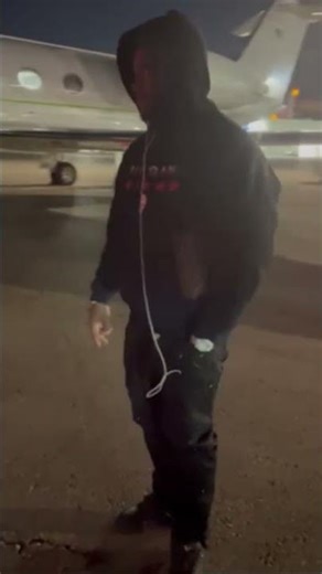 Birdman with Drok outside the jet