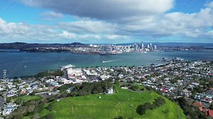 Auckland, New Zealand: Aerial drone footage of Auckland CBD skyline view from the Mount Victoria in Davenport in New Zealand largest city.