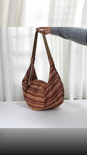 Ae PooiM on Instagram: "How to make a shoulder bag from a circular fabric piece. Learn more: Watch full video version with measurement detail on my youtube channel “Ae PooiM” as link in Bio Or copy and paste the address below into your browser to check it out here. https://www.youtube.com/watch?v=E2140lAJtYk&t=468s #diy #sewing #howto #sewingproject #reelsviral #fabricbag #reelsviralシfb"