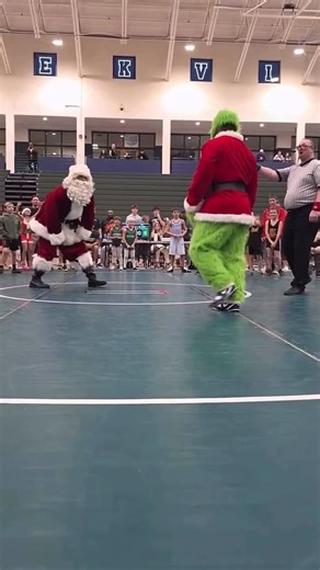 Olympic Wrestling on Instagram: "We heard The Grinch was stealing @the_rudis gifts from under the tree so we asked Santa to come save the day. Merry Christmas, wrestling fans. 😂🎅🎄"