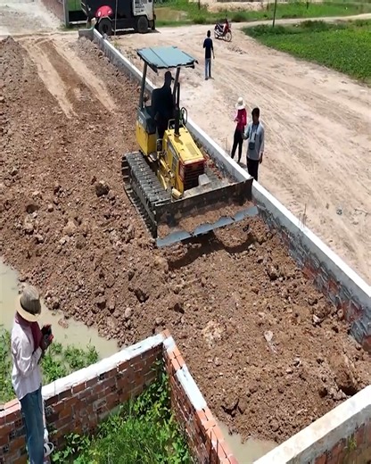 Best Teamwork!!! Komatsu 20P bulldozer helps with landfilling project for building projects | Bulldozer Operator