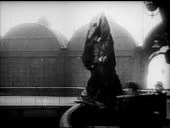 Parachute pioneer Franz Reichelt dressed in parachute suit standing...