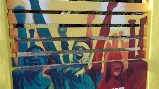 A Mural For The PSU Worldwide, there has been a long history of murals for laborers, most pronounced in Mexico with the Muralism movement a century ago. And now the PSU and artist Alex Sander have added to this fine tradition with a mural from artist Alex Sanker in front of their Belize City office. They wanted something with that visual pop, highlighting what the union stands for. And, according to the president, Sanker was the only one that delivered exactly that. We spoke to both of them at t