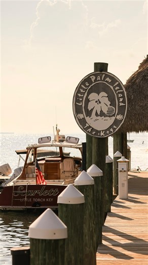 Experience the island aboard the Scarlett. Drift across turquoise waters beneath the island sun or toast the golden hour with champagne and coastal-inspired bites. | Little Palm Island