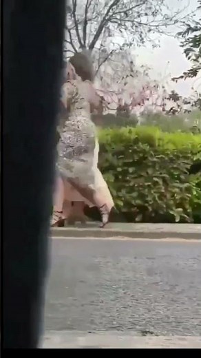 Two drunk ladies are walking on the street and then falling down. 😄