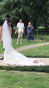 At this wedding, a mischievous cat refused to leave the bride’s gown — maybe it just wasn’t ready to let her go! 🐱💍 #weddingcrasher #catapprovalrequired #felineobsession #purrfectmoment | Shanghai Daily 上海日报
