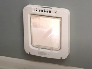 Pose d'une chatière grande taille à travers un mur (vidéo)