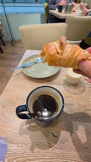 I love taking the croissant and dipping it in the coffee! | Exploring with Josh