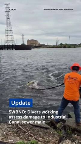 Diver investigates Industrial Canal sewer main break