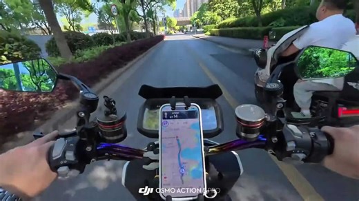 Dashcam captures motorcycle collision at intersection in Jiangsu, China