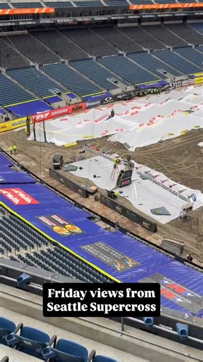The @dirt_wurx crew🚜 had to work QUICK this week! With the Seattle Seahawks winning the Super Bowl last weekend, they had their Championship🏆 parade end with a ceremony at the Lumen Field on Wednesday. As soon as it ended, Dirt Wurx started hauling🚚 dirt into the stadium. The track is built and covered, and rigs are a little behind this morning with parking and getting setup in the pits. 🎥 @brian.c.photo | Motocross Action