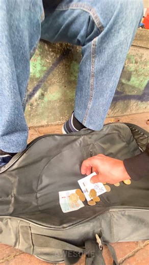 4.1K views | Street musician not used to attention | Awesome | Facebook