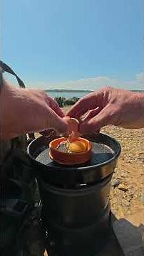 Simple bacon and egg roll with the Trangia 27 spirit burner. #campingfood #trangia #trangia_moment
