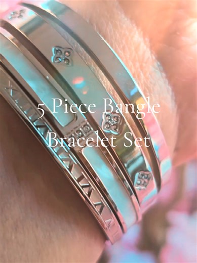 Five piece stainless steel bangle set, silver, & stackable✨ Each one opens & locks securely around the wrist (they are oval & look small, but they actually fit most wrists) #tiktokshopcreatorpicks #silverjewelry #banglebracelets #stackablebracelets
