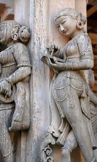 Explore the intricate female figures carved in Palitana's Jain temples.