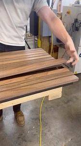 Building custom walnut slat panels. Our customers are saying “I’m beyond impressed with the work CW Woodcraft did for my office. Their skill and attention to detail really show in the beautiful custom wood ceilings and walls they crafted. The space feels completely transformed, with a warmth and elegance that wasn’t there before. If you’re looking for top-notch craftsmanship, I highly recommend them for any custom wood project!” #woodwall #architecturaldetail #slatwall | Cory Wasmus