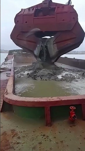 Large Grab Dredger in Active Dredging Operations