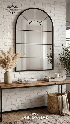 Your front hallway is the gateway to your beautiful home, and it deserves to be styled with absolute luxury. Make an unforgettable entrance by adding the stunning 32x20 Inch Arch Window Pane Mirror from Salkala Decor to your hallway decor. This exceptionally crafted piece is highly designed to immediately capture attention, reflecting beautiful natural light and visually widening narrow hallway spaces to make them feel infinitely more welcoming. The sophisticated arch top combined with the class
