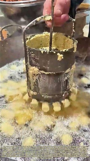 Frying the Bites: How a Vendor Uses a Perforated Mold to Make Uniform Fried Mung Bean Balls