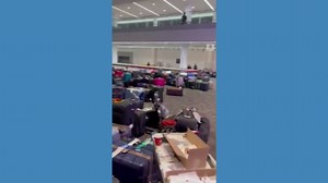 Large piles of luggage seen at Toronto Pearson International Airport