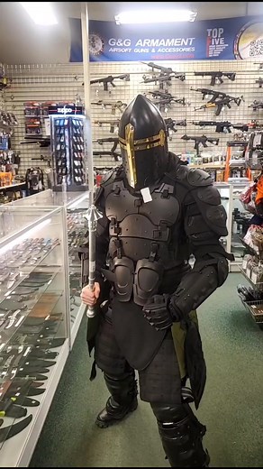 Trying on Different Helmets at Local Army Surplus Store