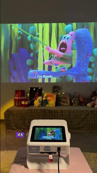 Watch Movies From Bed With a Ceiling Projector Setup