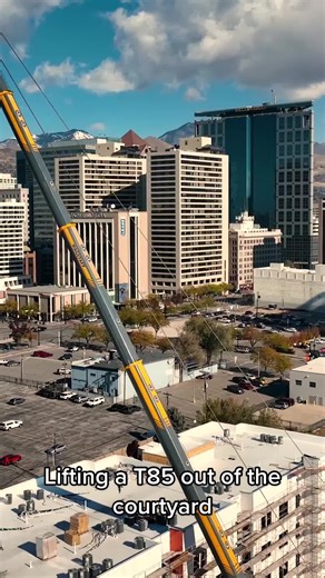 Lifting a Potain T85 Out of the Courtyard