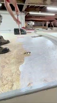 TPO roof glue roller technique for RV roofs #roofing #rv #construction