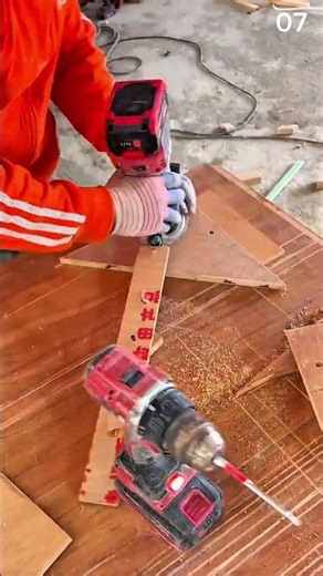 Drilling wood surface using red power drill accurately
