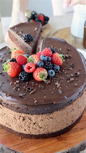 40K views · 896 reactions | This Chocolate Mousse Cake is the ultimate indulgence for any chocolate lover. Imagine layers of rich chocolate cake, a silky-smooth chocolate mousse, and a glossy chocolate ganache finish, all coming together to create a decadent dessert that’s perfect for celebrations or any special occasion.  Check out this amazing recipe here: https://www.piesandtacos.com/chocolate-mousse-cake/ | Pies and Tacos | Facebook