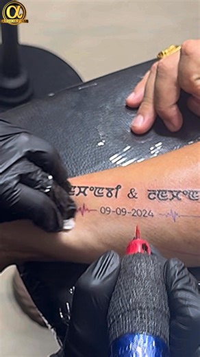 This tattoo beautifully represents the eternal connection between two souls, marked with their names in a unique script and sealed with a special date, 09-09-2024. The heartbeat line symbolizes life, love, and the shared journey that continues through time. A powerful blend of emotion and meaning, this design stands as a permanent reminder of love, unity, and togetherness. 15 Hashtags: #LoveTattoo #CoupleTattoo #HeartbeatTattoo #EternalBond #NameTattoo #ScriptTattoo #DateTattoo #ForeverLove #Mat