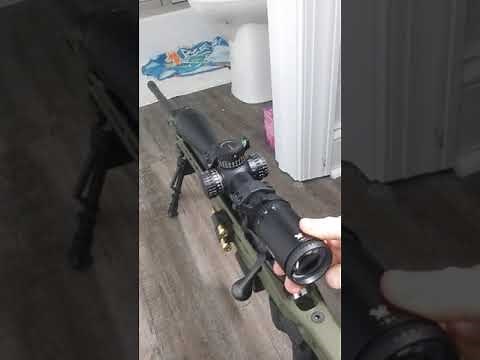 Rifle scope plumb bob method.
