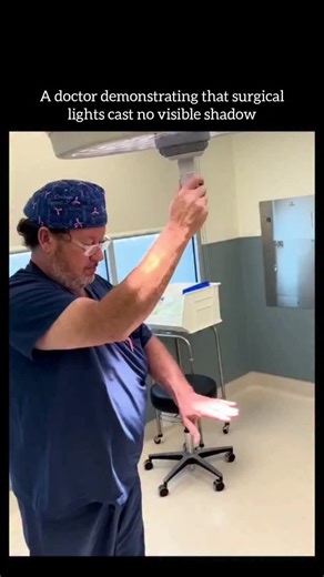 Insidee Out on Instagram: "Surgical lights don't cast visible shadows because they use many light sources arranged in a ring - just like stadium lights shining from all sides of a playing field. Imagine standing in the middle of a football stadium at night: if there's just one spotlight, your shadow is big and dark. But when bright lights surround the whole stadium, every direction sends light at you, and any shadow gets filled in by light coming from the other side, so your shadow almost disapp