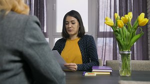 Young woman during an interview - Free Stock Video