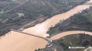 Incredible video! California's Oroville Dam released water from its spillway due to rising floodwaters from heavy rain. The dam's spillway was damaged as a result forming a huge hole. | AccuWeather