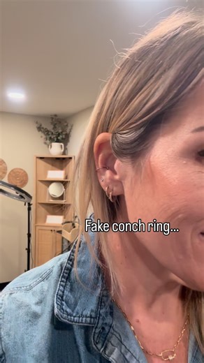 Sara Hess || INK BABE @ SHE Beauty Bar on Instagram: "🚫more fake conch ring… so I pierced my own 😏💥 Worth it? Watch till the end. (Disclaimer: I am a trained and certified piercing artist… I do not recommend doing this on your own if you have not been trained and certified) . . . #ConchPiercing #comealongwithme #piercingstudio #ohio #watchme"