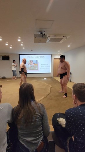 Had a fun and informative time learning about sumo last night. This was a demonstration of one of the exercises they do. #osaka2025 #osakatravel #osaka #OsakaJapan #sumo #sumowrestling | Kimberly Wylie