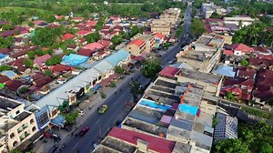 Aerial 4k video of Pekanbaru city. The capital city of Riau province with many residential buildings.